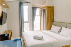 Comfy Studio at Amazana Serpong Apartment By Travelio